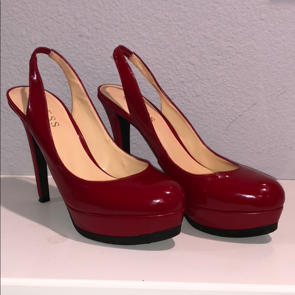 Red patent leather closed toe heels
